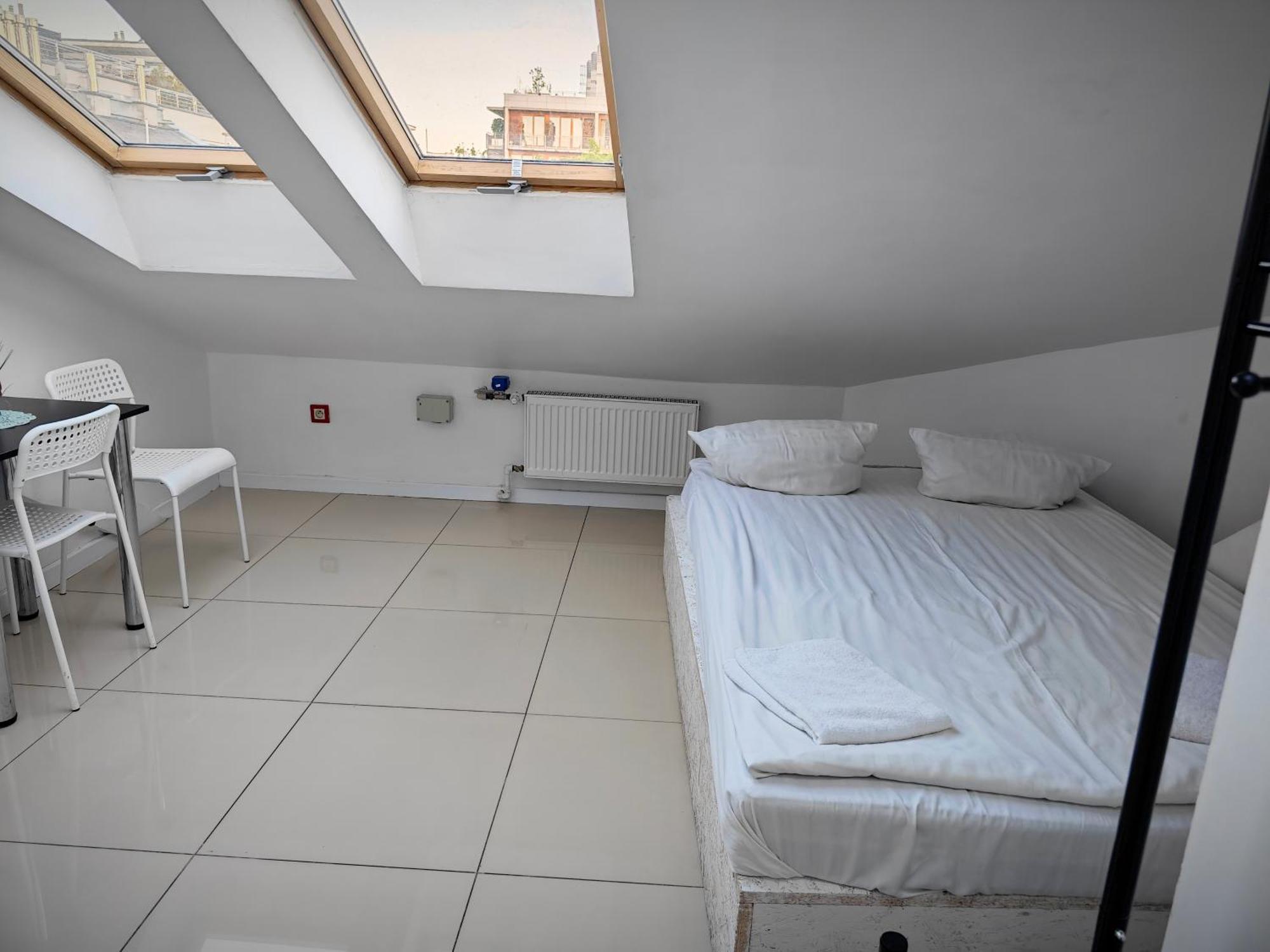 Apartamenty Hoza Attic Studio Варшава Номер фото