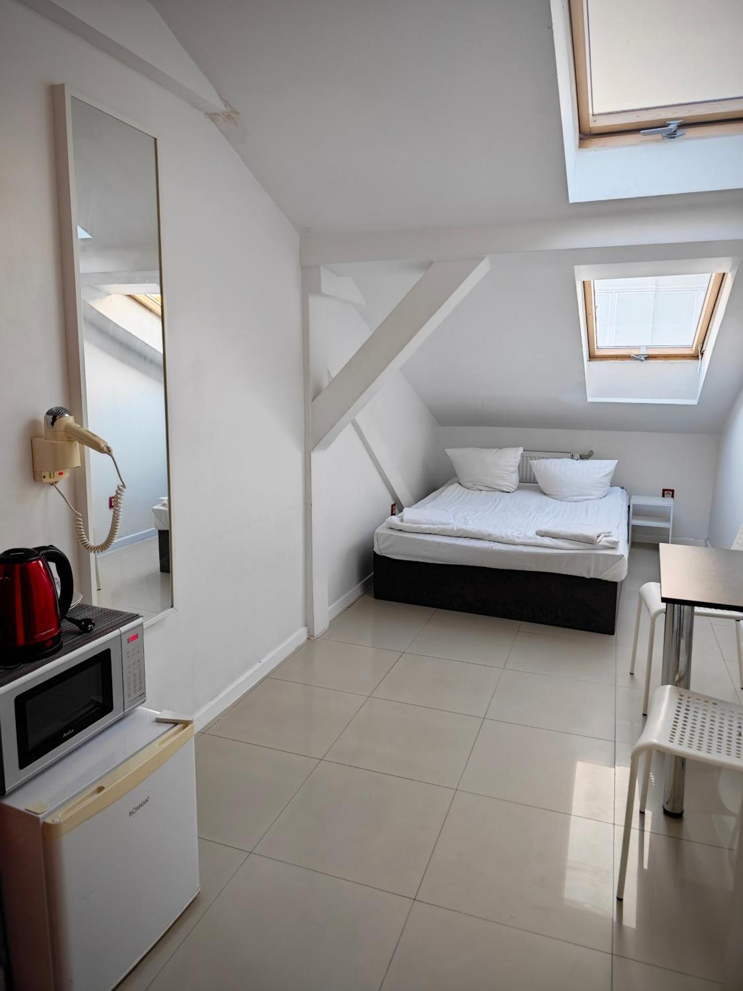 Apartamenty Hoza Attic Studio Варшава Номер фото