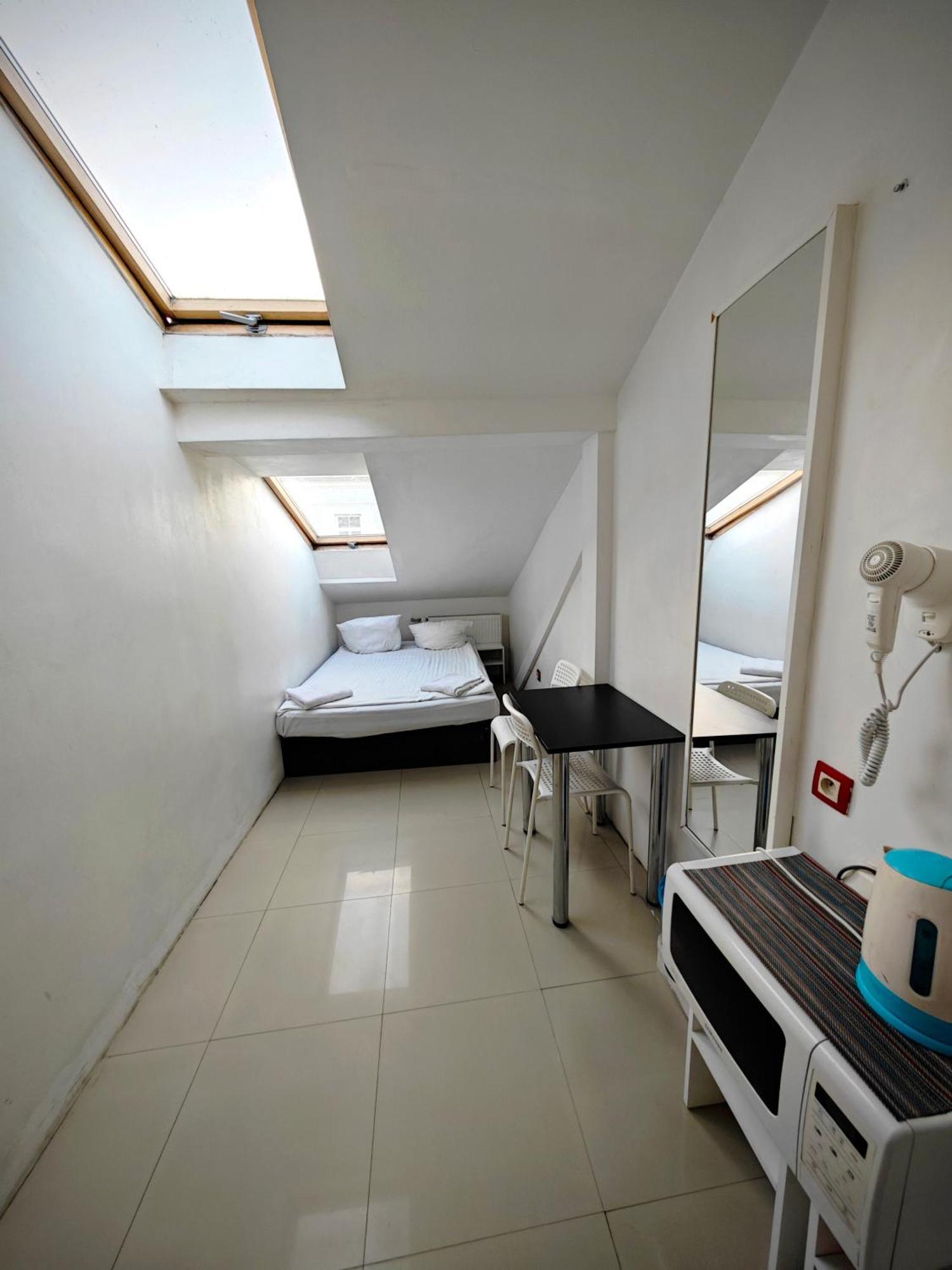 Apartamenty Hoza Attic Studio Варшава Номер фото