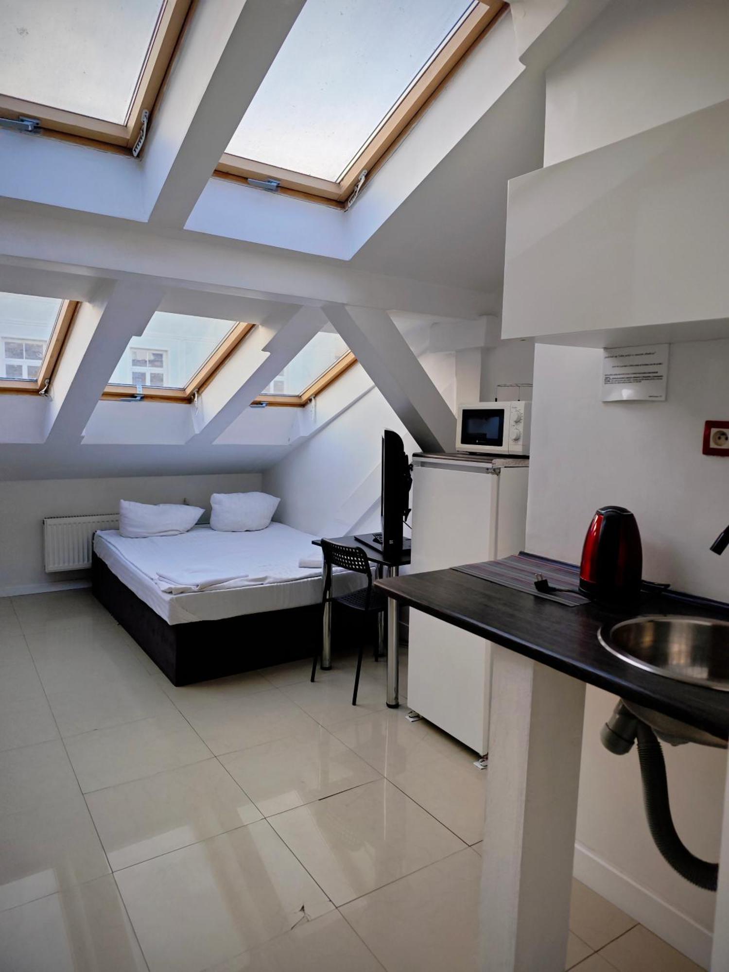 Apartamenty Hoza Attic Studio Варшава Номер фото